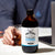  First Press Coffee - Big Boy 500m Cold Drip Coffee - Bottle sitting on desk next to laptop